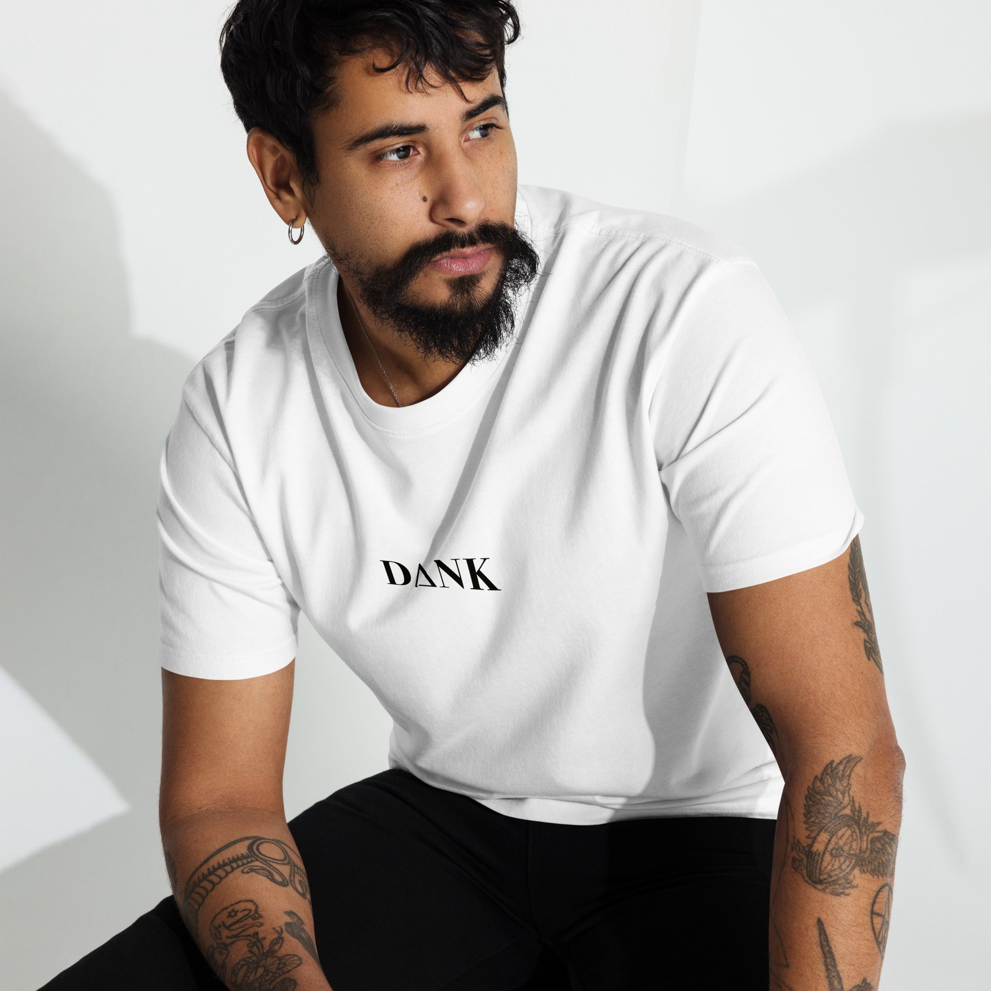 model wears a Tee that says Dank on it