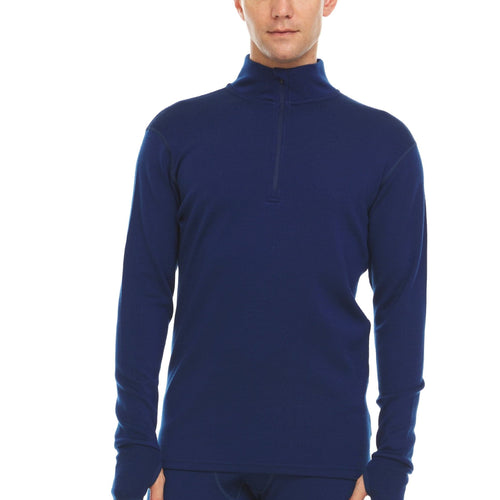 A man wearing a navy blue 100 percent merino wool athletic quarter zip shown from the waist up against a solid white background.