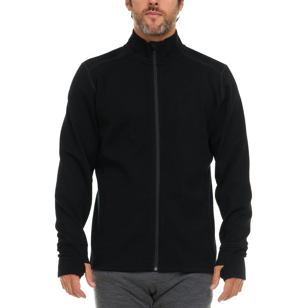 A bearded man wearing a black 100 percent merino wool full zip sweater shown from the waist up against a solid white background.