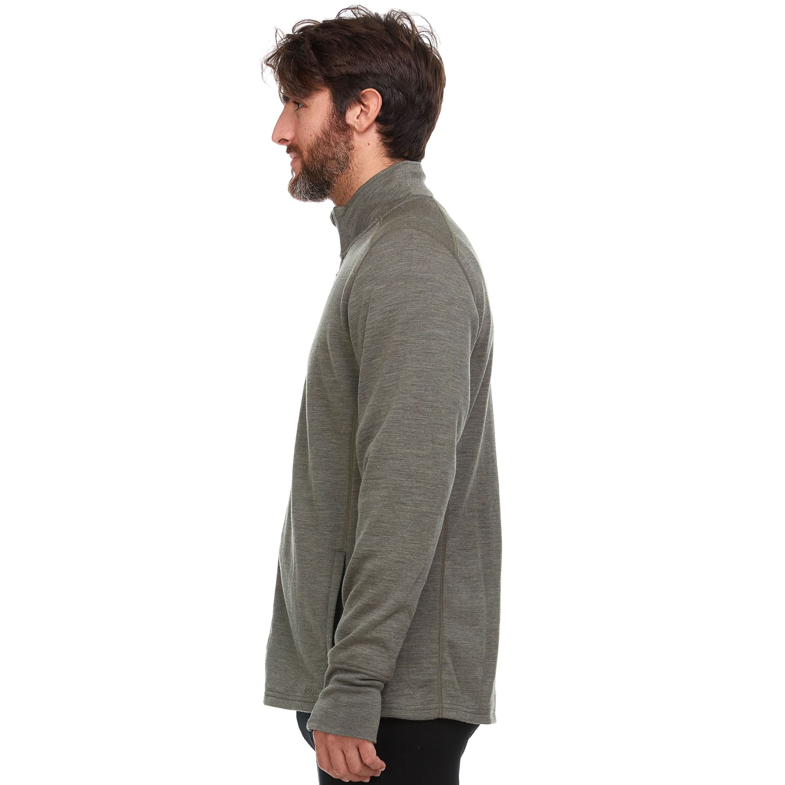 a bearded man wearing a granite green 100 percent merino wool full zip sweater shown from the side against a solid white background.