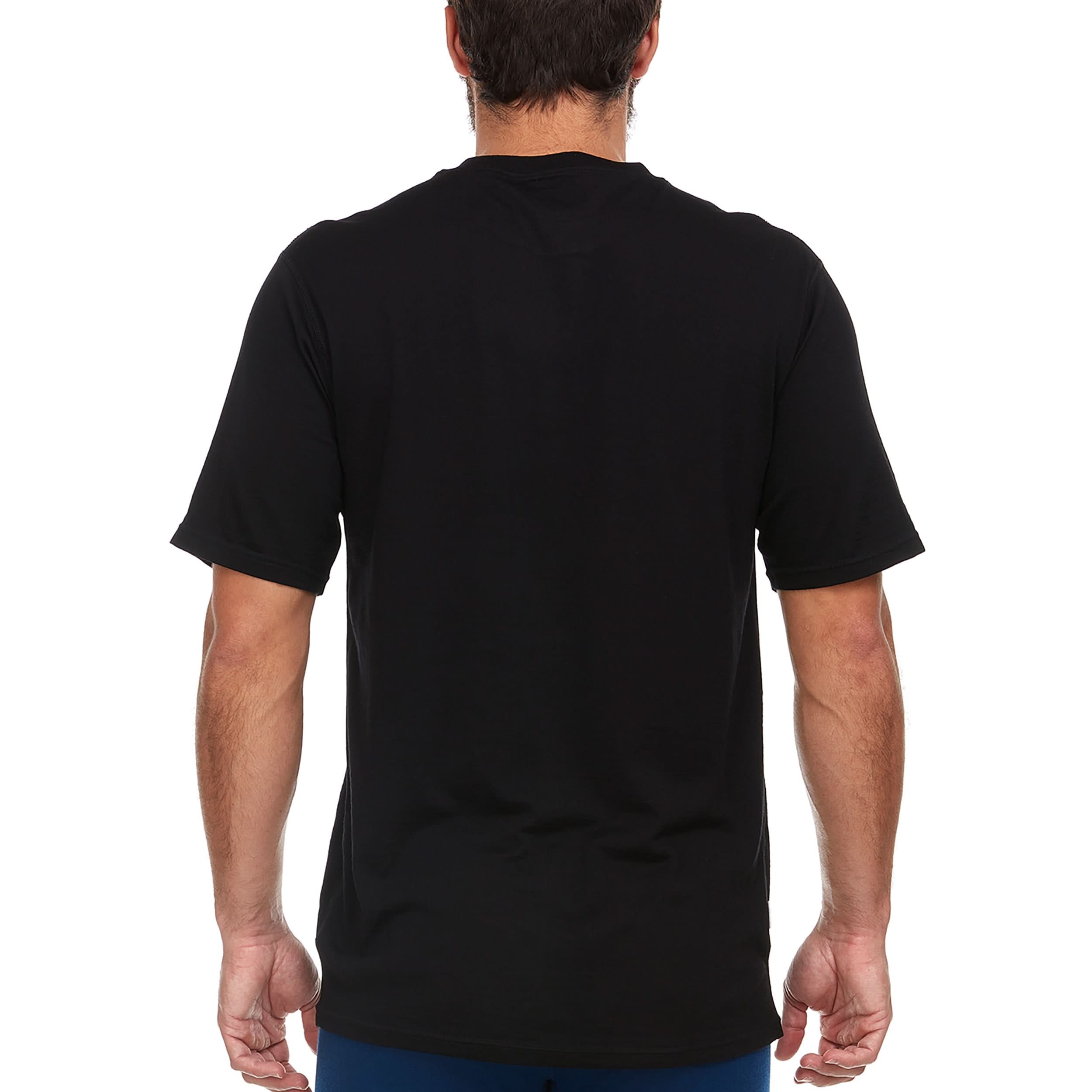 A man wearing a black 100 percent merino wool t shirt shown from the back against a solid white background.