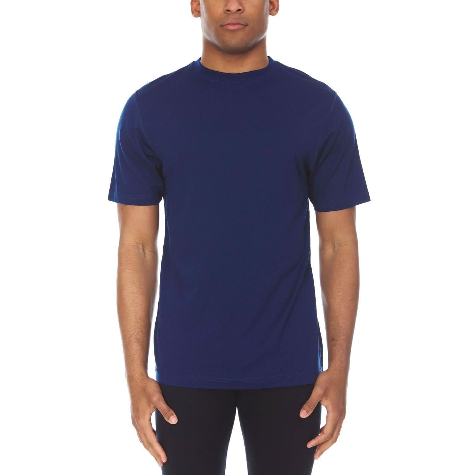 A man wearing a navy blue 100 percent merino wool t shirt shown from the waist up against a solid white background.