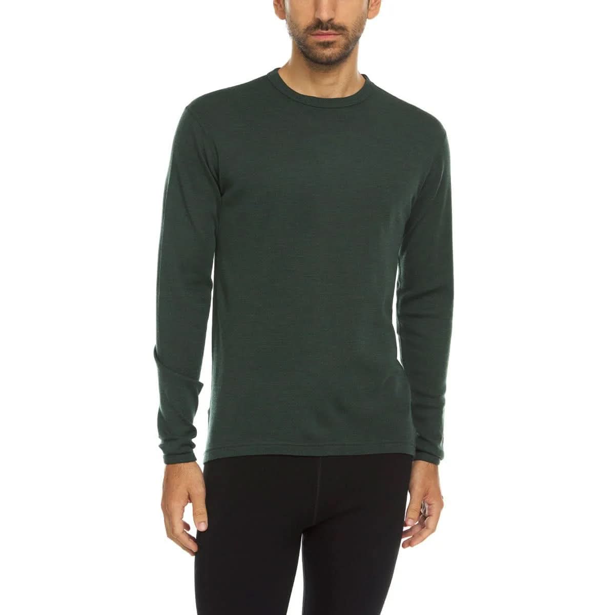 Man wearing a forest green long-sleeve 100% merino wool base layer  on a white background