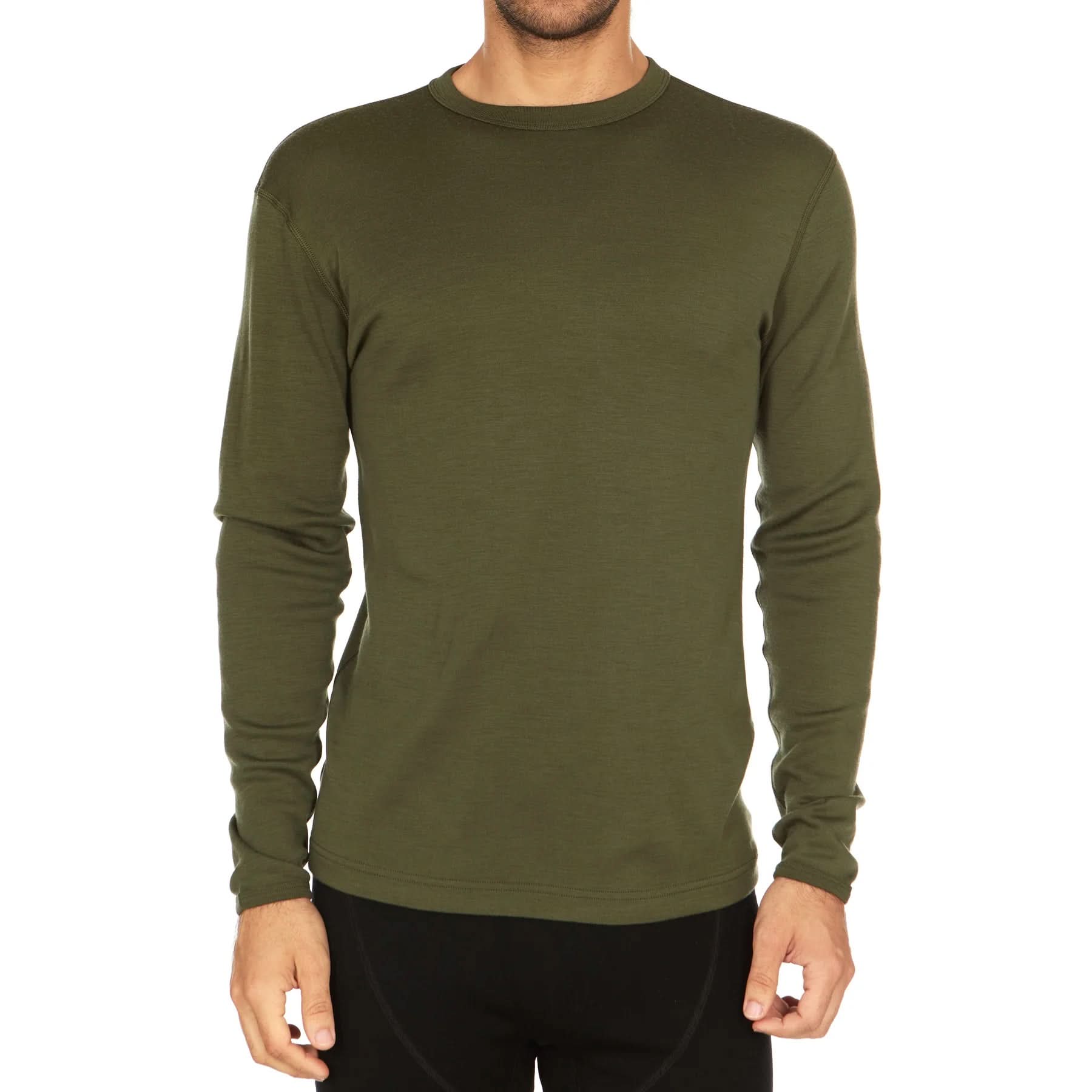 A man wearing an olive green 100 percent merino wool long-sleeve crewneck base layer top, shown from the waist up against a plain white background.