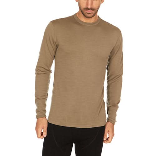 Man wearing a tan long-sleeve 100% merino wool base layer top in desert sand color on a white background