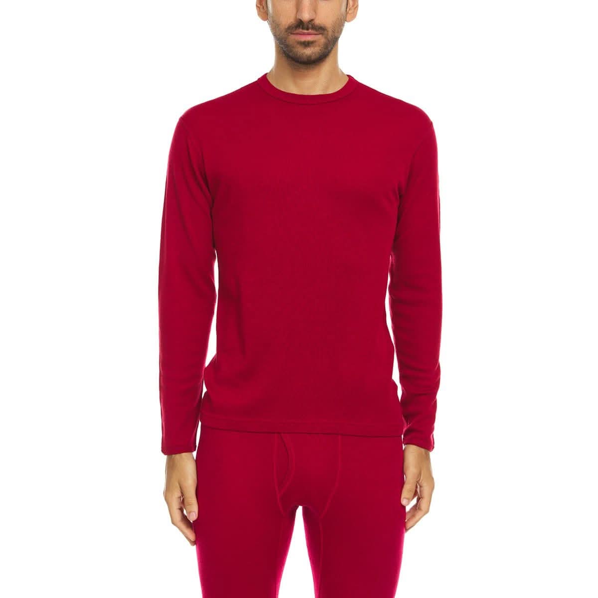 Man wearing a red long-sleeve 100% merino wool base layer top  on a white background